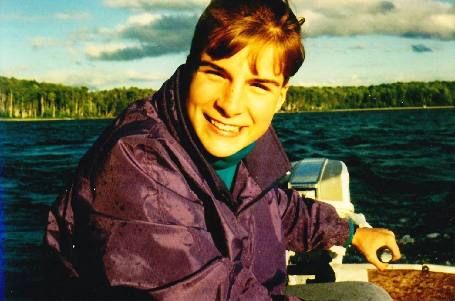 Marc driving boat